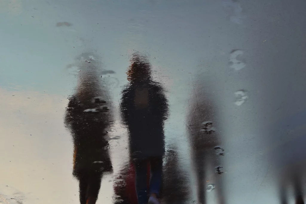people in the rain