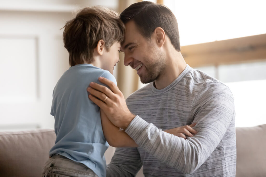 Loving young dad and little son enjoy time together